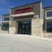 Exterior view of the new Community Care Partners urgent care clinic in Manor, Texas.